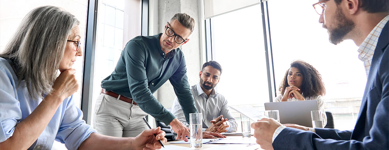 Multicultural business people working on research