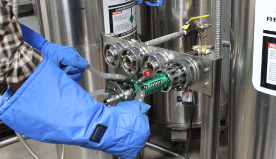 Woman operating a fueling pump