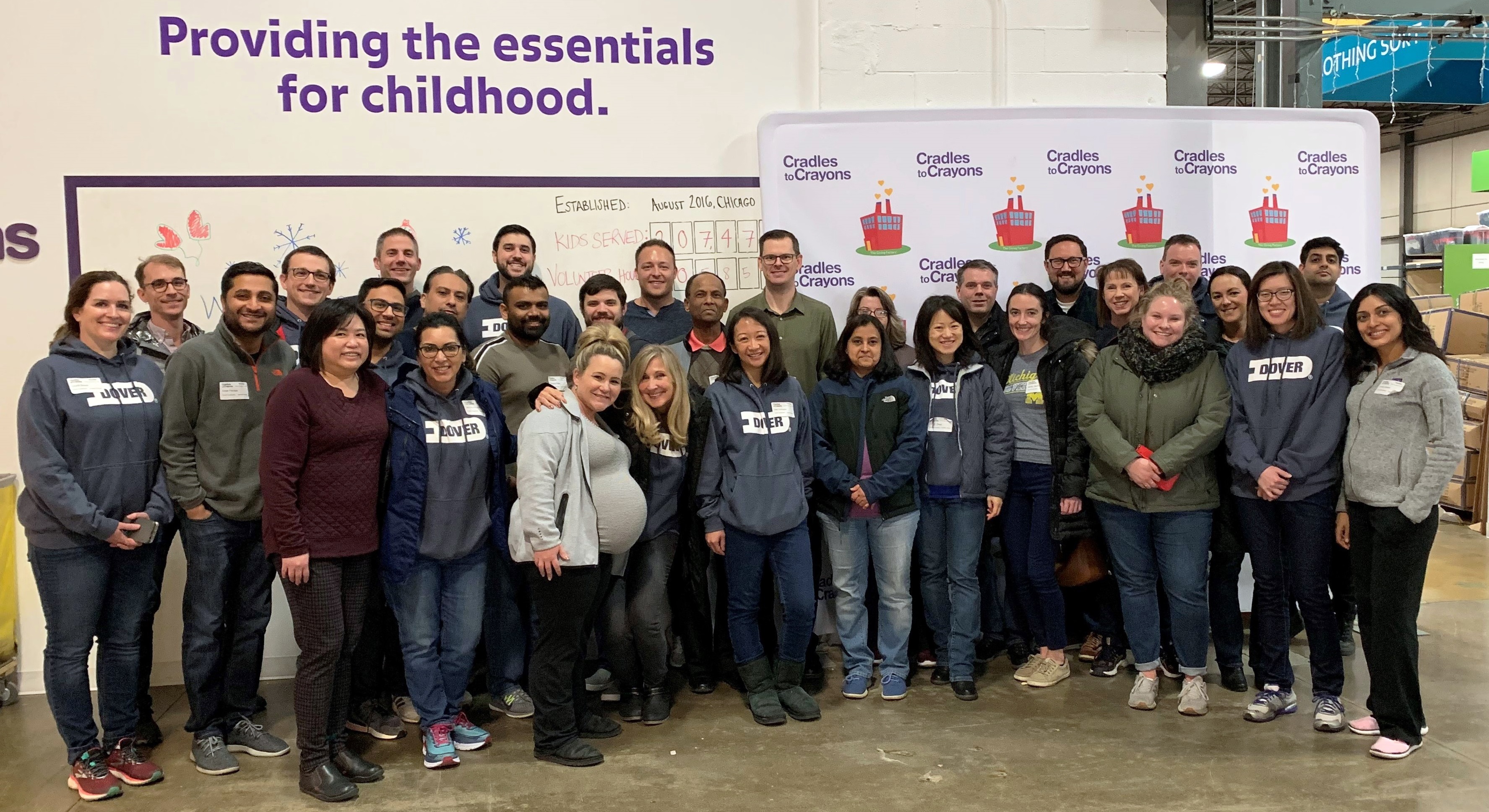 Dover Team Members Volunteer at Cradles to Crayons 