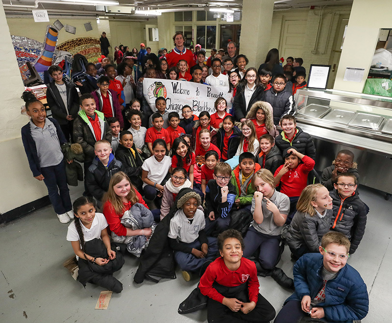 John Hayden of the Blackhawks with Prescott Magnet School Students